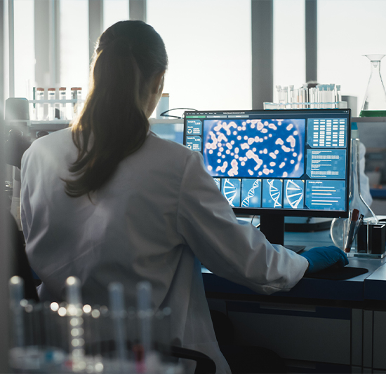 iStock-1291031613 lab technician extracting samples from test tubes