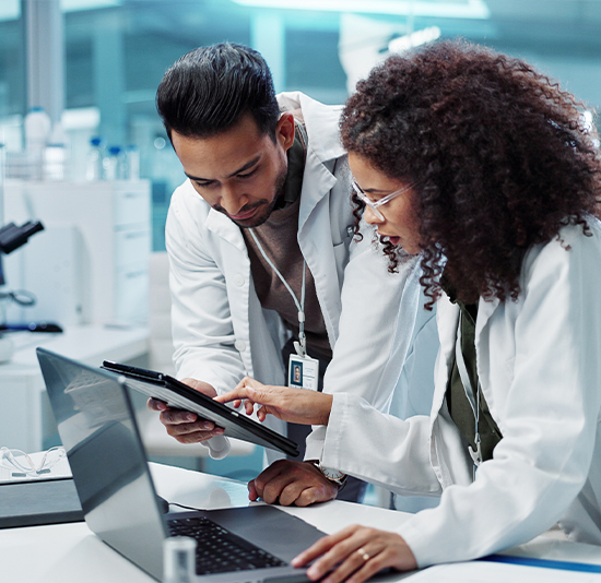 iStock-2036497686 lab technician extracting samples from test tubes
