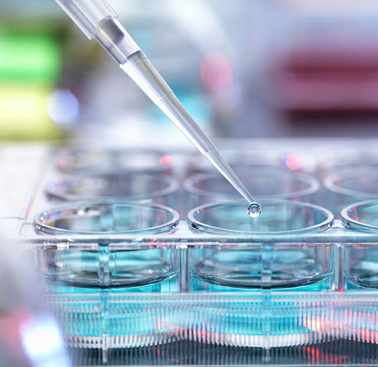 iStock-2214034810 lab technician extracting samples from test tubes